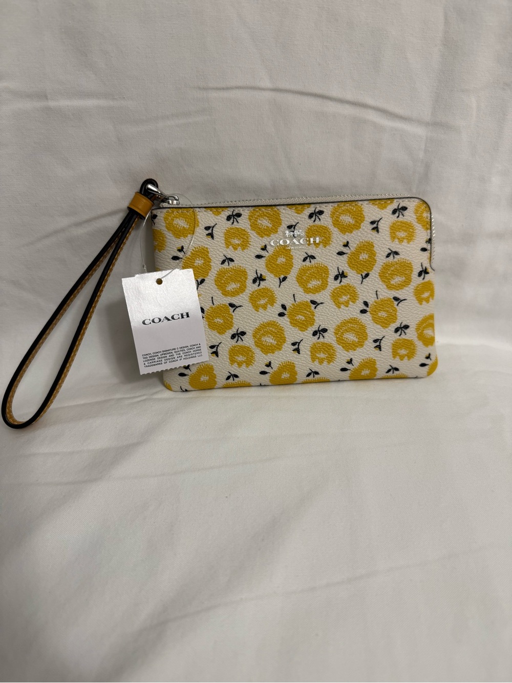 Coach Corner Zip Wristlet in buttercup floral print